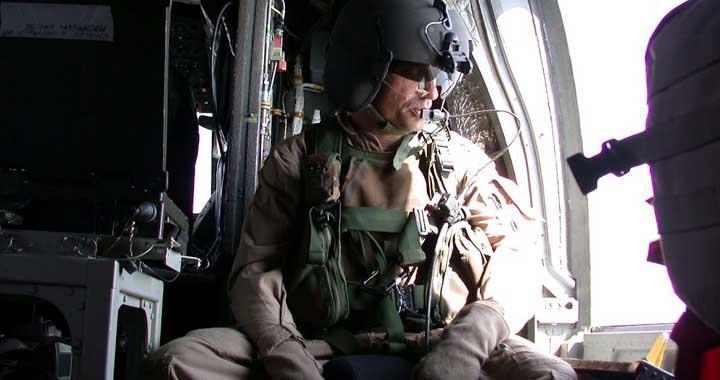 Soldier in a kinook on fly to Chakoti Pakistan